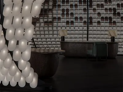 Modern restaurant interior with industrial lighting, concrete bar, and seating