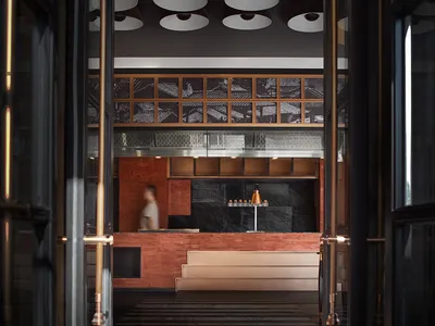 A metallic lobby space with a modern and industrial feel, featuring a bar counter and abstract ceiling lights.