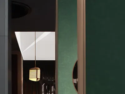 Modern restaurant bar with metallic pendant lighting and leather stools.