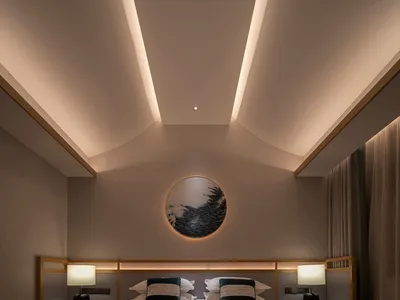 Modern bedroom featuring plush textiles, fabric curtains, and a wooden frame.