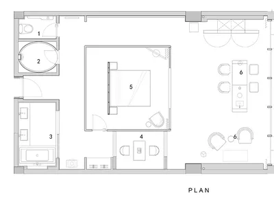 Floor plan of a minimalist bedroom with a double bed, nightstand, and lamp in a rectangular room with white walls and a white
