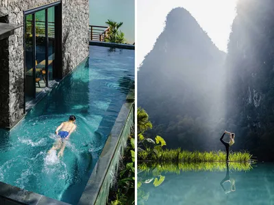 A man swimming in a modern hotel poolside with concrete walls and a view of the mountains.