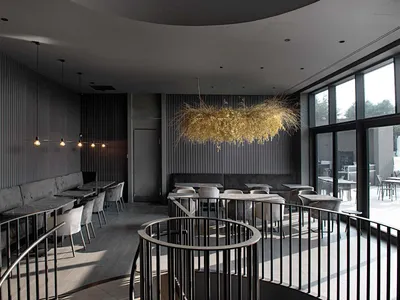 Modern restaurant interior with black and glass seating area and circular black railings.