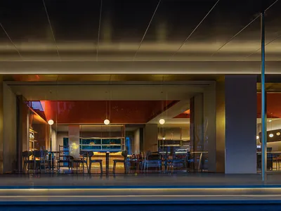 Modern, sleek restaurant interior with metal accents