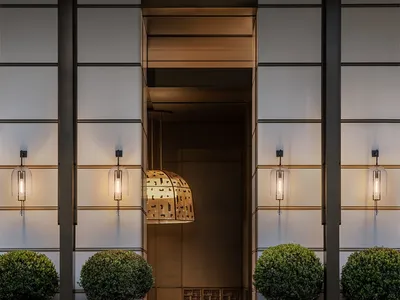 Modern hotel entryway featuring thermal concrete
