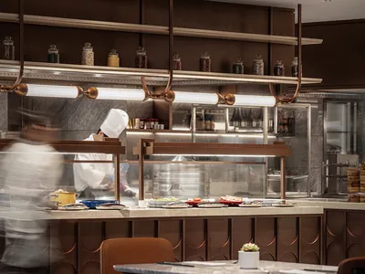 Modern industrial kitchen with wooden counter and marble backsplash