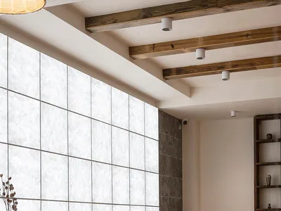 Interior design featuring industrial living room with wooden furniture and floor.