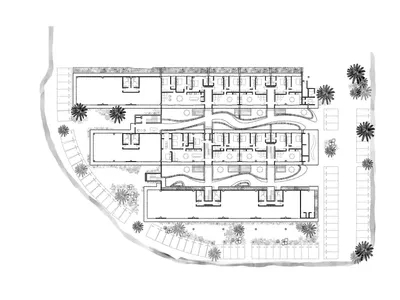 A detailed black and white architectural plan of a hotel layout.