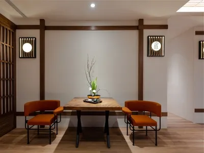 A modern wooden restaurant console with metal accents and seating.