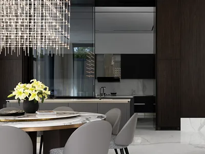 Modern kitchen with marble countertop, glass cabinetry, and industrial design elements.