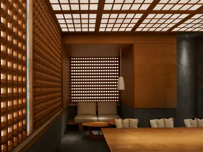 溫馨餐廳內部，木質牆面、金屬點綴，餐桌環繞座椅，燈光柔和