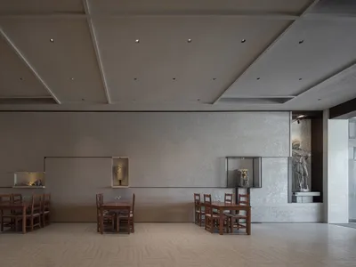 Empty restaurant with wooden tables and chairs, clean and well-organized, ready for customers