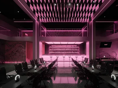 Modern restaurant interior with pink walls and flooring, featuring multiple chairs and tables in a stylish setting