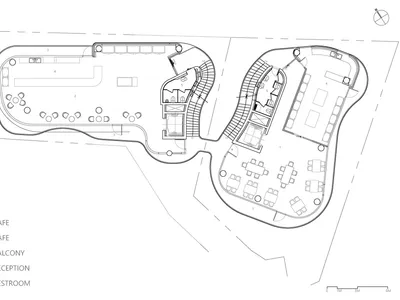 2D floor plan of a modern hotel with curved design, multiple rooms, and hallways, featuring linework, labels, and measurements