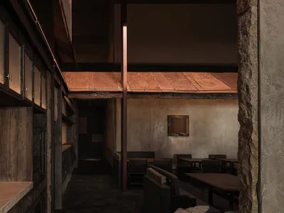 現代餐廳內部，包含用餐區、酒吧與柔和燈光