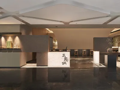 現代亞洲餐廳內部，寬敞餐區融入木質與石材元素，牆面藝術品裝飾，配有多張桌椅