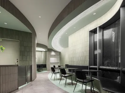 現代弧形餐廳內部，多張餐桌與座椅，營造舒適親切的氛圍