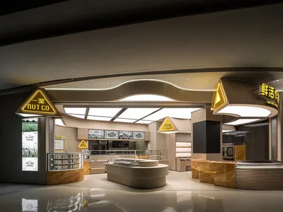 Spacious restaurant interior with modern furniture, sleek surfaces, and a well-lit dining area
