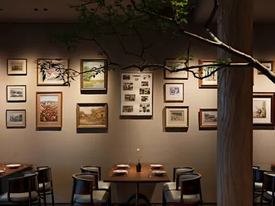 Warm and inviting restaurant interior with tables, chairs, framed pictures, and a central tree, surrounded by natural elements and artistic decorations