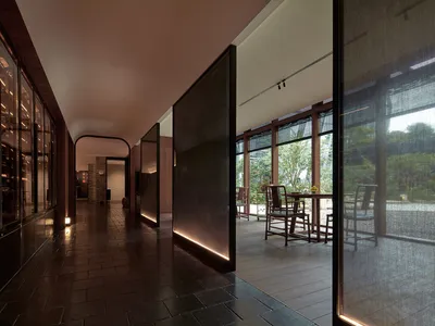 An inviting open concept dining area with a wooden dining table and four chairs, perfect for meals and gatherings