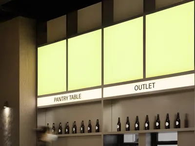 A cozy restaurant dining area with wicker chairs, tables, and bottles, set in a warm and inviting atmosphere