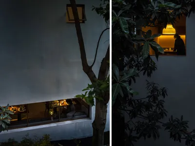 溫暖舒適的家用餐廳場景，搭配露台與樹木，呈現黑白與彩色視角