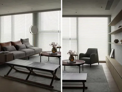 Well-furnished living room with couches, chairs, tables, and a potted plant, creating a comfortable and inviting atmosphere