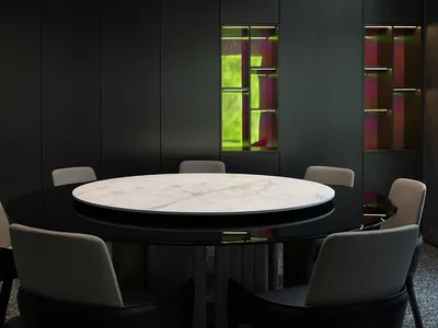 Dining space with a round marble table, four chairs, and a chandelier in a black color scheme