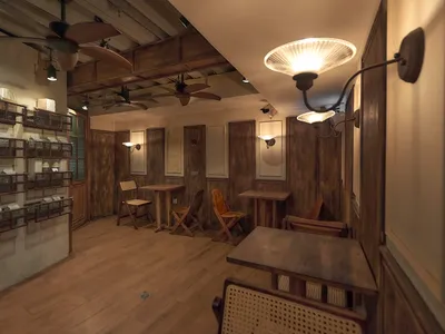Warm and inviting living space with wooden floors and walls, featuring comfortable seating areas and a mix of natural and artificial lighting
