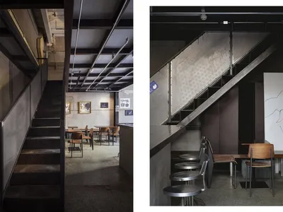 現代餐廳內部設計，包含樓梯、椅子、餐桌與沙發，營造明亮且溫馨的氛圍
