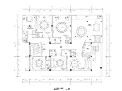 2D floor plan of a modern hotel with various rooms and spaces, including a kitchen, dining area, living room, and bedrooms, with a focus on openness and efficient use of space