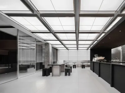 現代餐廳內部，擁有寬敞用餐區、多張餐桌、椅子與沙發，展現簡潔實用的設計
