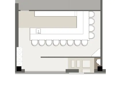 2D floor plan of a hotel with diverse room layouts, well-lit with natural light through windows and skylights
