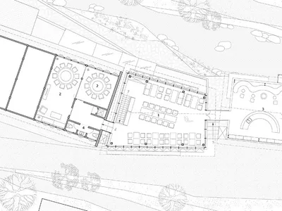 Architectural drawing of a hotel lobby with chairs and dining tables in a luxurious and comfortable environment