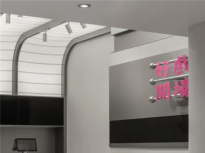 A modern restaurant interior with pink chairs and tables, a black and white color scheme, and a comfortable atmosphere
