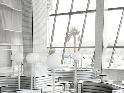 Modern restaurant interior with a circular dining area, metal booths, and chairs, surrounded by a clean and inviting atmosphere