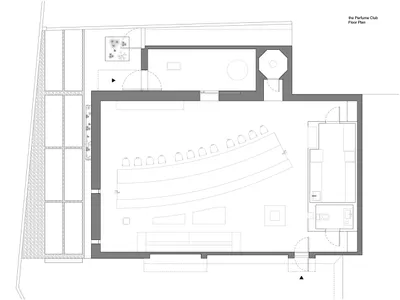 A 2D floor plan of a modern hotel with multiple rooms and areas for relaxation and socializing, featuring chairs and a well-designed layout