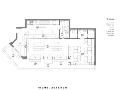 2D floor plan of a modern restaurant with various rooms and clear indications of different spaces and their functions