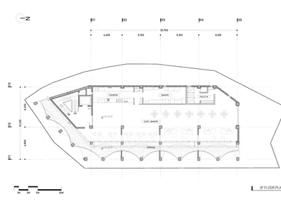 Large open hotel lobby with multiple rooms, including a dining area and a bar, featuring sleek lines and minimalistic decoration