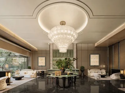 Spacious living space with white walls, high ceilings, furniture, potted plants, and decorative vases