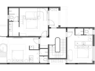 Black and white floor plan of a house with a living room, kitchen, and dining room, featuring linework, labels, and measurements