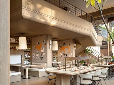 A warm and inviting living space with a wooden floor, a dining table, kitchen area, and staircase, filled with furniture and decorative items