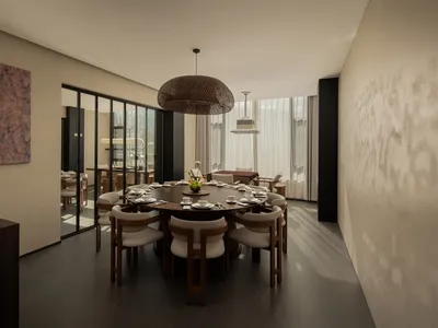 一間溫暖的餐廳，木質的餐桌、椅子和沙發，伴隨著各種裝飾品和一盆植物