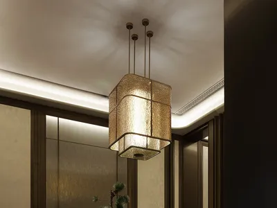 A dining room with a chandelier, a dining table, and a potted plant, with a combination of natural and artificial lighting