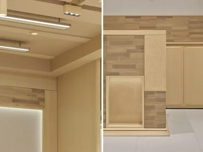 Clean modern bathroom with a wooden floor and white walls, featuring a sink and toilet