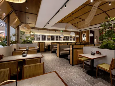 A modern restaurant with a large dining area featuring wood and metal elements, soft lighting, and a warm atmosphere
