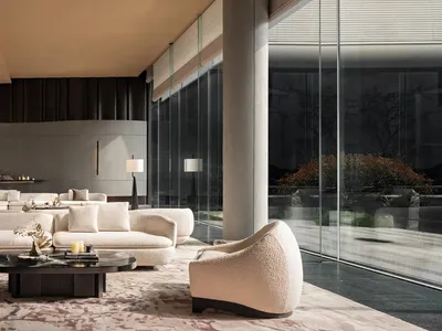 A modern living room with a large window, white furniture, and a dining table, filled with natural light