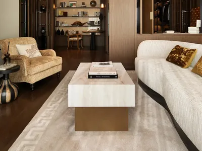 Warm and inviting living and dining space with wooden furniture, decorative items, and natural lighting