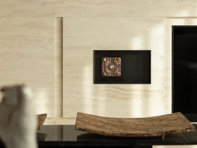 A classic modern dining room with a white marble wall, a wooden table, and a vase, set against a black frame, creating a sophisticated atmosphere