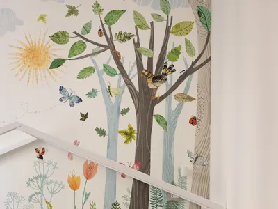 Children's bedroom with white wooden beds, sage green bedding, stuffed animals, and a vibrant nature-themed mural covering the slanted wall and ceiling.